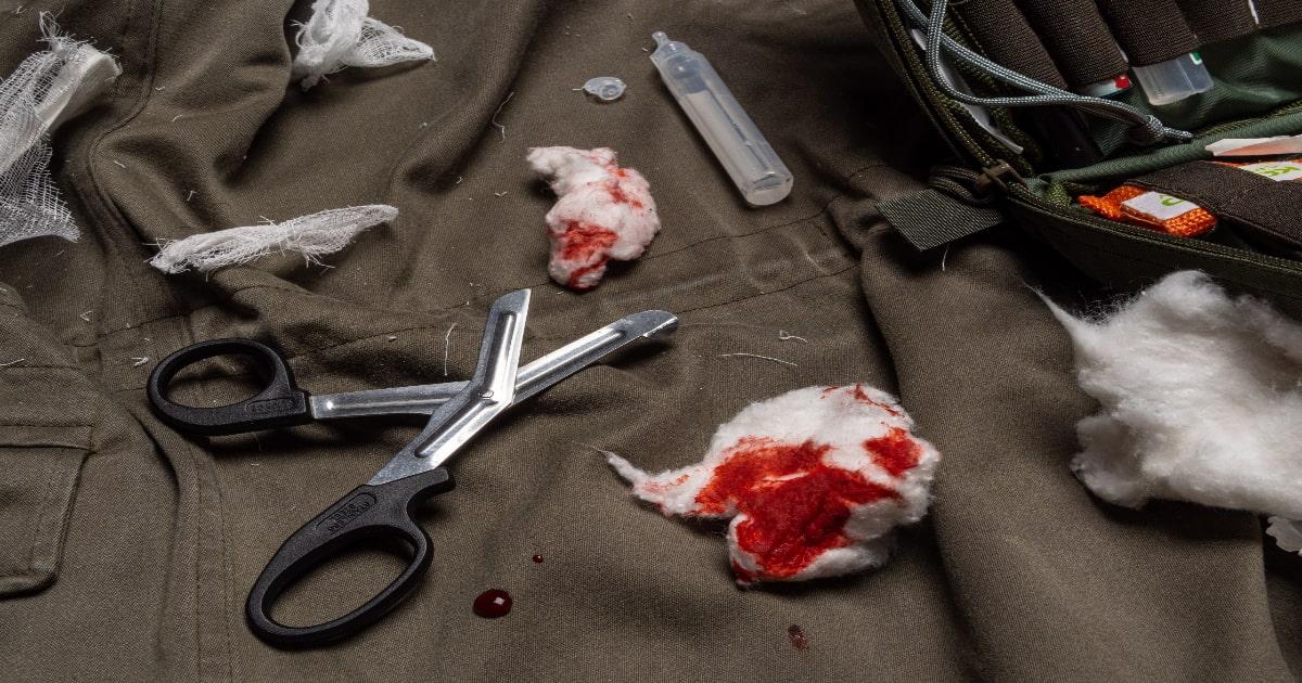 bloody trauma cotton wool balls scissors